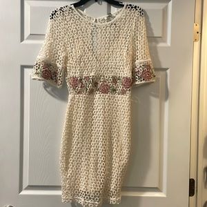 Beautiful crochet dress with floral detail